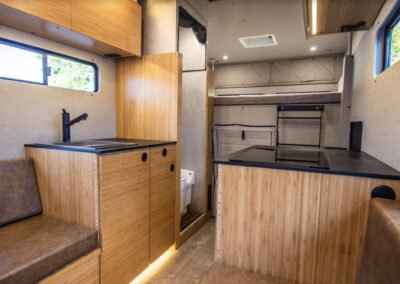 Image of the inside of a Baja truck camper highlighting the interior build out.