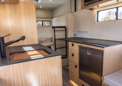 The Rogue - Chevy 3500 Truck Camper - Kitchenette with fridge
