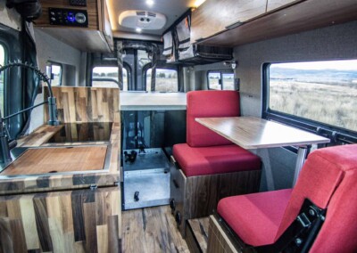 The Pisca - Sprinter 144" 4x4 for sale. Full living area view.